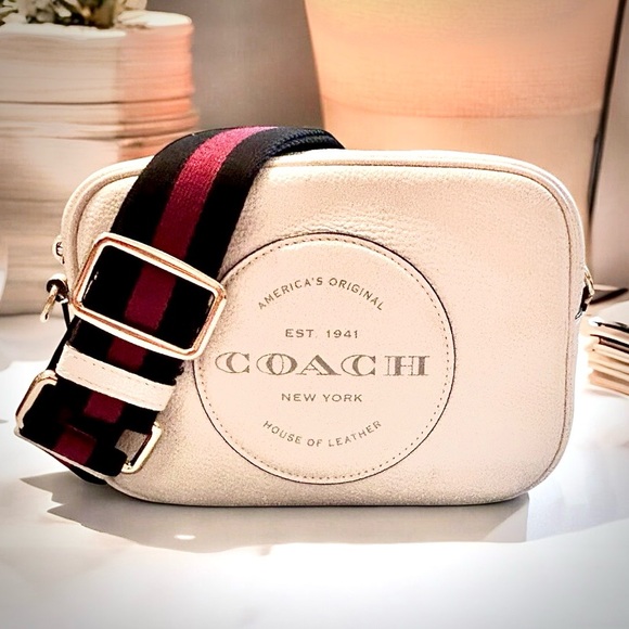 Coach Handbags - Coach Cream Crossbody Bag with Black and Burgundy Stripe Strap
